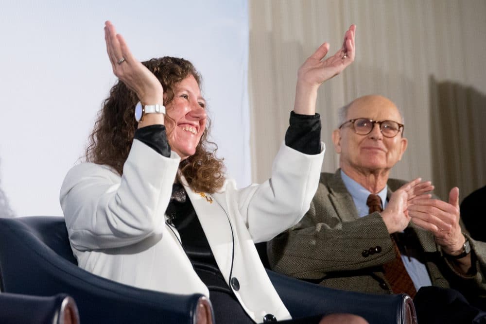Laser Interferometer Gravitational-Wave Observatory (LIGO) Scientific Collaboration Spokesperson Gabriela Gonzalez, and Laser Interferometer Gravitational-Wave Observatory (LIGO) Co-Founder Rainer Weiss applaud during a news conference at the National Press Club in Washington, Thursday, Feb. 11, 2016, as it is announced that scientists they have finally detected gravitational waves, the ripples in the fabric of space-time that Einstein predicted a century ago. (Andrew Harnik/AP)