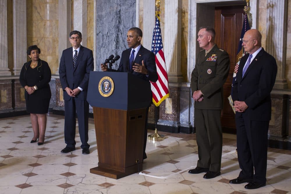 President Barack Obama (C) speaks on the Orlando shooting at the Treasury Department while Attorney General Loretta Lynch (L), Treasury Secretary Jack Lew (C-L), Chairman of the Joint Chiefs of Staff General Joseph Dunford (C-R) and Director of National Intelligence James Clapper (R) look on, on June 14, 2016 in Washington, DC. Obama directly attacked Donald Trump's proposal to ban Muslims from entering the United States. (Photo by Jim Lo Scalzo-Pool/Getty Images)
