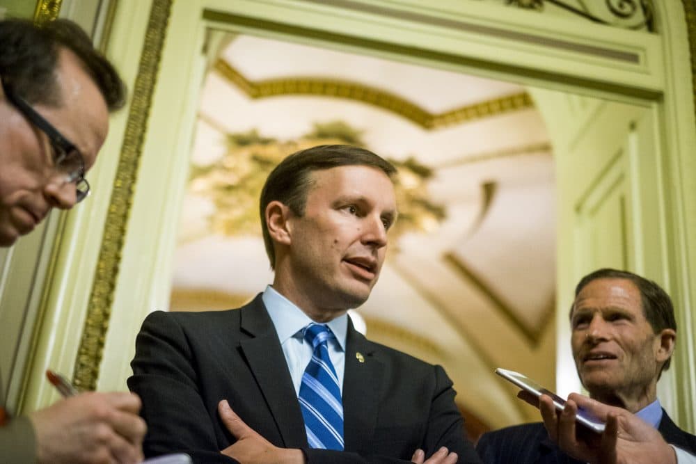 Senator Richard Blumenthal (D-CT), (R), looks on as Senator Chris Murphy (D-CT) speaks to reporters after waging an almost 15-hour filibuster on the Senate floor in order to force a vote on gun control on June 15, 2016 in Washington, DC. (Photo by Pete Marovich/Getty Images)