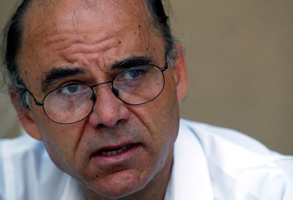 U.S.-trained architect-turned-author Kanan Makiya, speaks during an interview in Baghdad, Iraq, July 26, 2003. (Manish Swarup/AP)