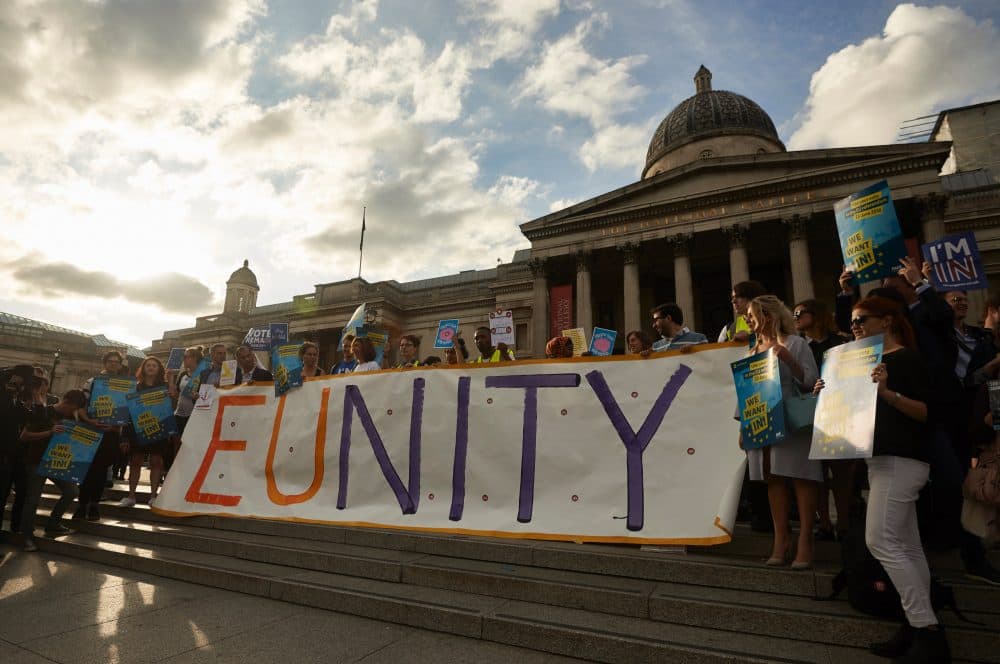 Pro-EU supporters hold placards and banners during a 'Yes to Europe' rally in London's Trafalgar square, ahead of Thursday's EU referendum, in central London on June 21, 2016.
Prime Minister David Cameron pleaded with Britons Tuesday to think of their children and their economic well-being before voting to quit the EU, as polls showed a razor-tight race with less than 48 hours before the referendum. (NIKLAS HALLE'N/AFP/Getty Images)