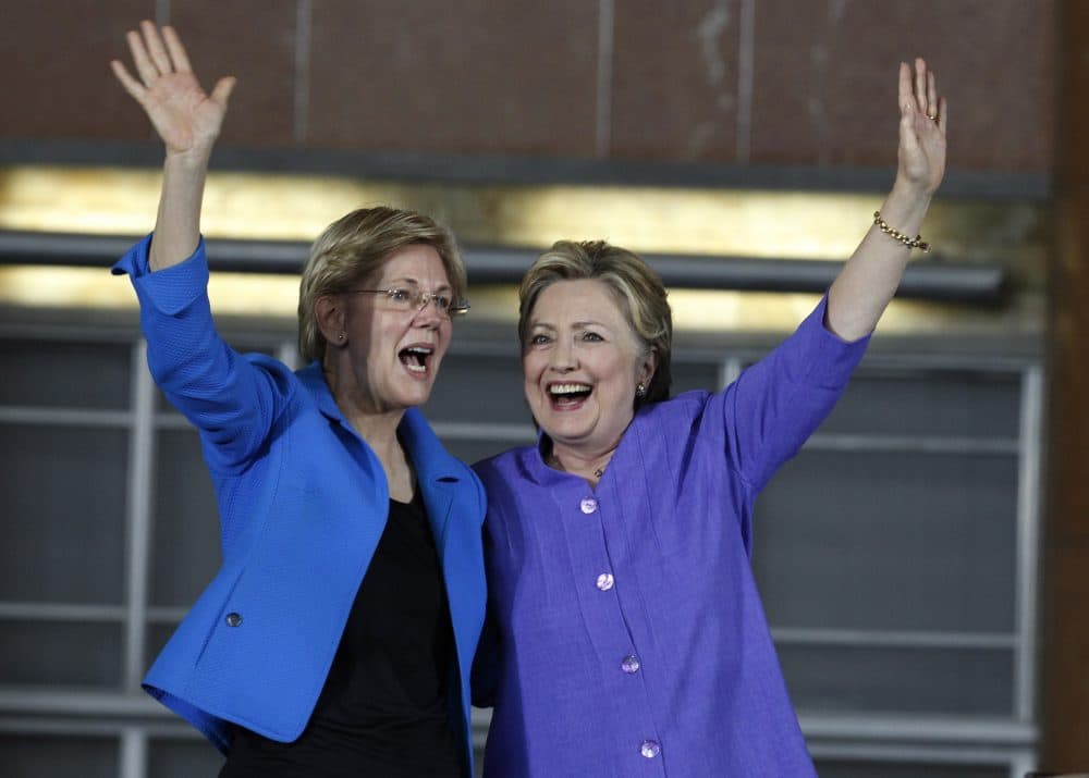 Democratic Presidential candidate Hillary Clinton (R) and U.S. Sen Elizabeth Warren (D-MA) wave to the crowd before a campaign rally at the Cincinnati Museum Center at Union Terminal June 27, 2016 in Cincinnati, Ohio. Warren is helping Clinton campaign in Ohio. (John Sommers II/Getty Images)