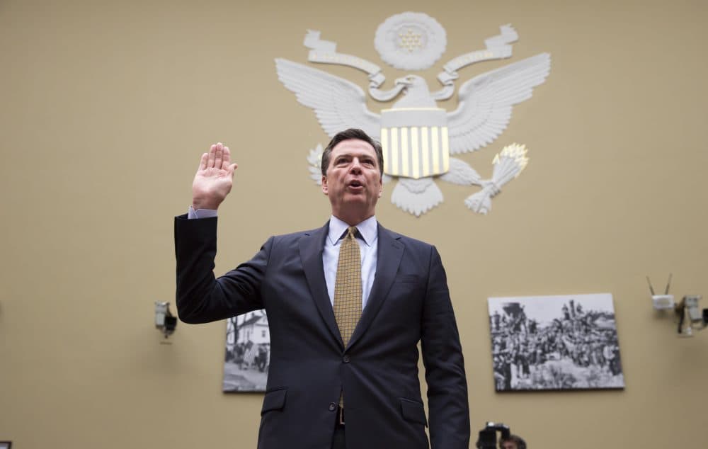 FBI Director James Comey is sworn in on Capitol Hill in Washington, Thursday, July 7, 2016, prior to testifying before the House House Oversight and Government Reform Committee hearing to explain his agency's recommendation to not prosecute Democratic presidential candidate Hillary Clinton over her private email setup. (J. Scott Applewhite/AP)
