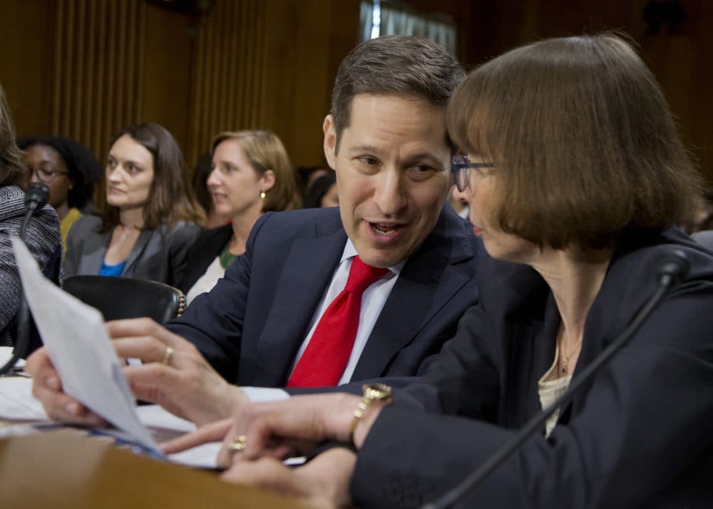 Centers for Disease Control and Prevention Director Tom Frieden, left, confers with State Department Bureau of Oceans and International Environmental and Scientific Affairs Acting Assistant Secretary Judith Garber, on Capitol Hill in Washington, Wednesday, July 13, 2016, as they wait to testify before the Senate Foreign Relations subcommittee hearing on the "Zika in the Western Hemisphere: Risks and response." (Manuel Balce Ceneta/AP)