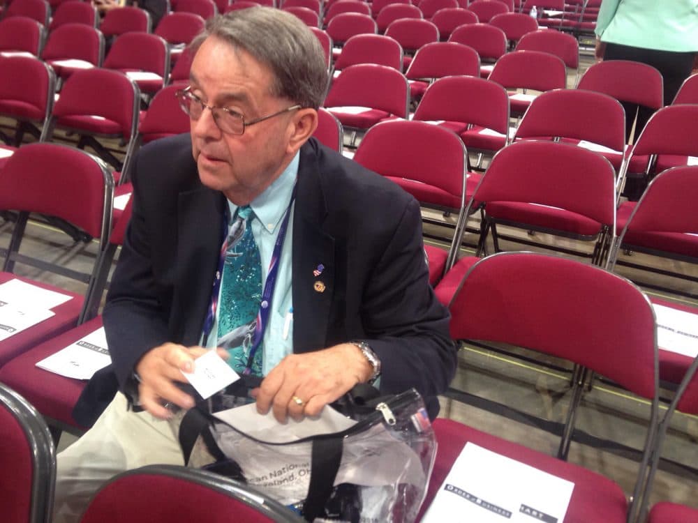 Art Rittenhouse, a New Jersey delegate, sits inside the Quicken Loans Arena in Cleveland during the Republican National Convention. (Peter O'Dowd/Here & Now)