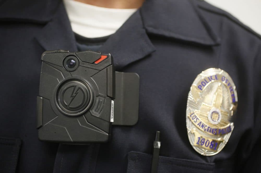 Boston Police Department's body camera pilot program is supposed to start in September, but the police union has filed an injunction to try to stop the city from forcing officers to wear the cameras. (Damian Dovarganes/AP)