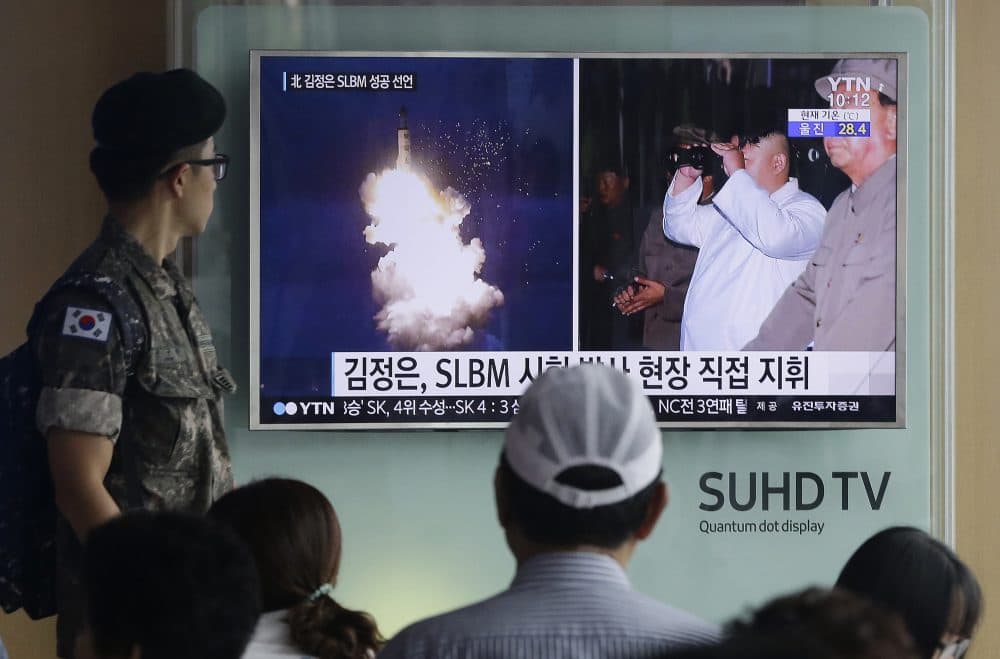 In this Thursday, Aug. 25, 2016, file photo, a South Korean army soldier watches a TV news program showing images published in North Korea's Rodong Sinmun newspaper of North Korea's ballistic missile believed to have been launched from underwater and North Korean leader Kim Jong-un, at Seoul Railway station in Seoul, South Korea. (Ahn Young-joon/AP)