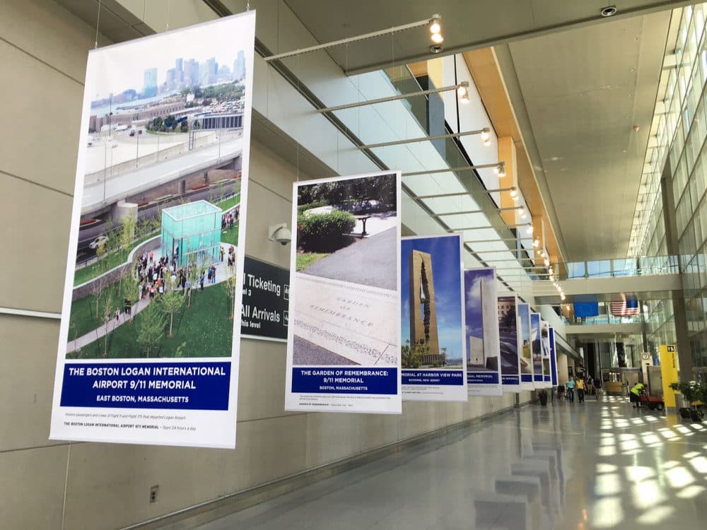The flags on display in Terminal E at Logan Airport. (Daniel Guzman/WBUR)
