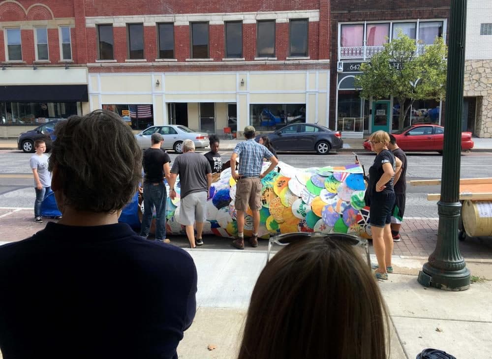 Volunteers prepare FireFish on a Saturday afternoon in Downtown Lorain, Ohio. (Matt Richmond/WCPN)
