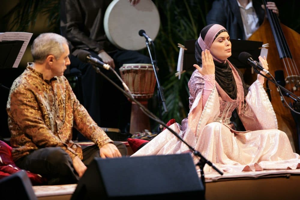 Performers Alim Qasimov (left) and Fargana Qasimova on stage during a 2008 performance of "Layla and Majnun" in Doha, Qatar. (Courtesy Silkroad)