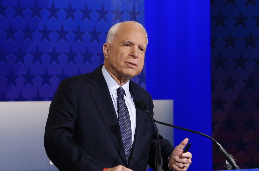 Arizona Republican Sen. John McCain talks with debate moderators prior to his debate with Democratic Rep. Ann Kirkpatrick, their only scheduled debate before next month's general election, Monday, Oct. 10, 2016, in Phoenix. (Ross D. Franklin/AP)