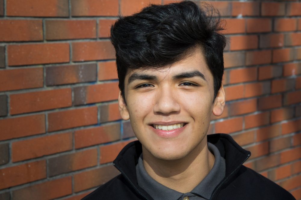 Emiliano Villa grew up in different financial circumstances than his older sister. (Courtesy Brett Myers via Youth Radio)