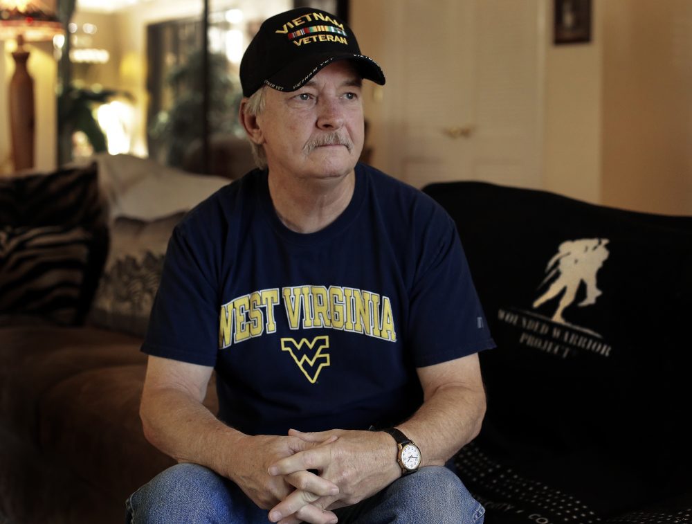 Mike Baughman sits for a photo at his home in Danville, Calif., on Tuesday, Aug. 2, 2016. The 64-year-old is among hundreds of veterans who have been diagnosed with cholangiocarcinoma, a rare form of bile duct cancer that may be linked to their time in the service and an unexpected source: parasites in raw or poorly cooked river fish. (Ben Margot/AP)