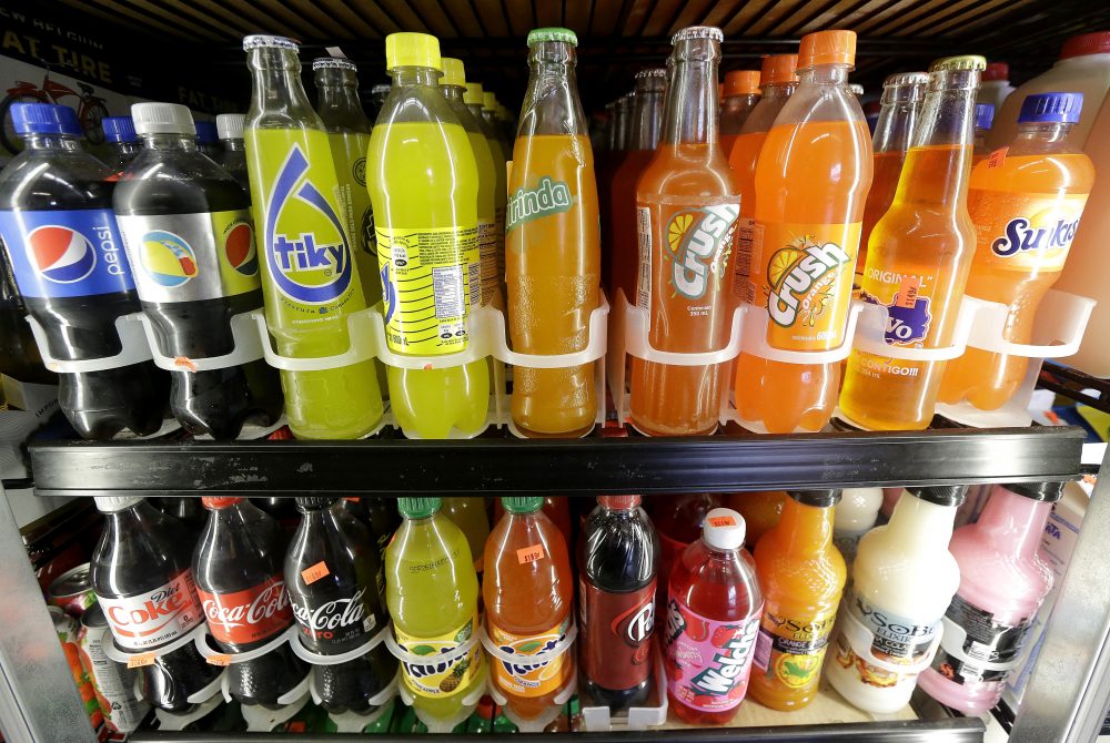Soda bottles are displayed in a refrigerator at El Ahorro market in San Francisco. (Jeff Chiu/AP)