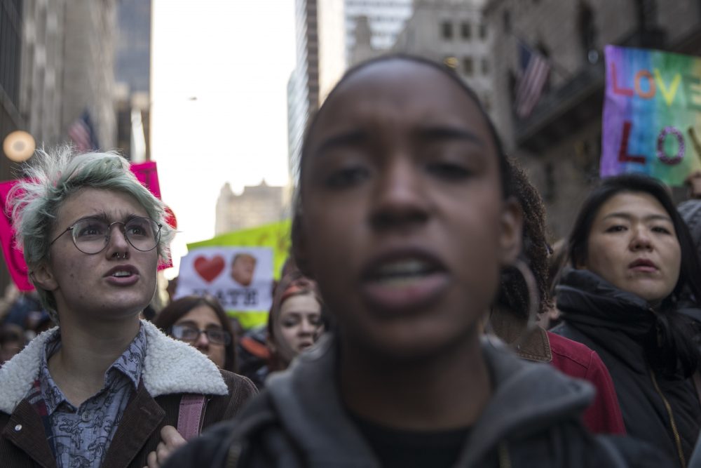 Protestors demonstrate against the election of President-elect Donald Trump during a rally outside Trump Tower, Saturday, Nov. 12, 2016, in New York. (Mary Altaffer/AP)