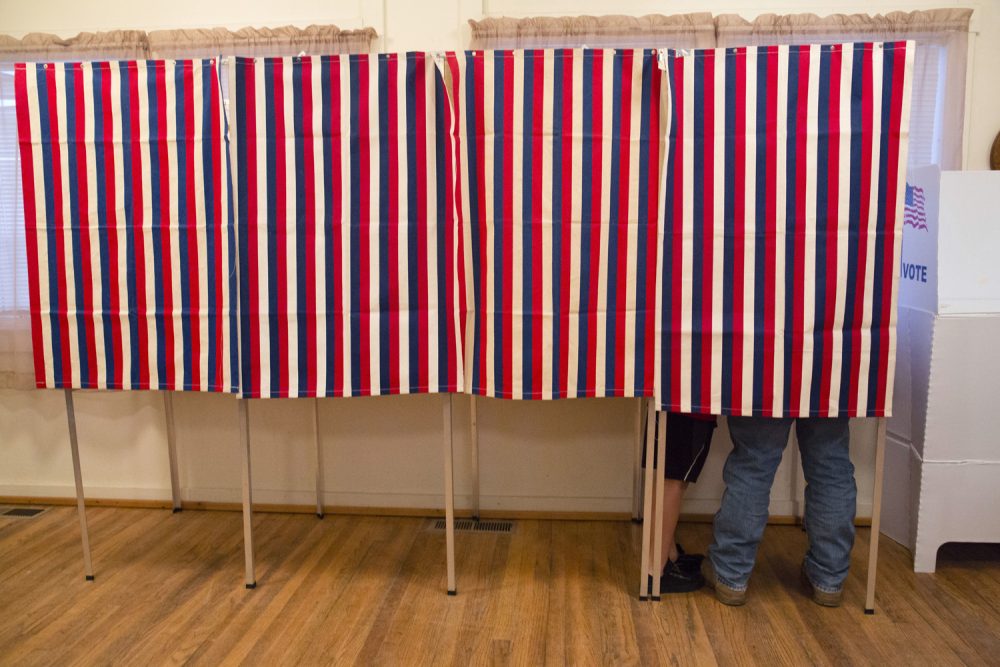 In this Nov. 8, 2016, photo, a voter fills out his ballot at the Wilson School House in unincorporated Wilson, Idaho. (Otto Kitsinger/AP)
