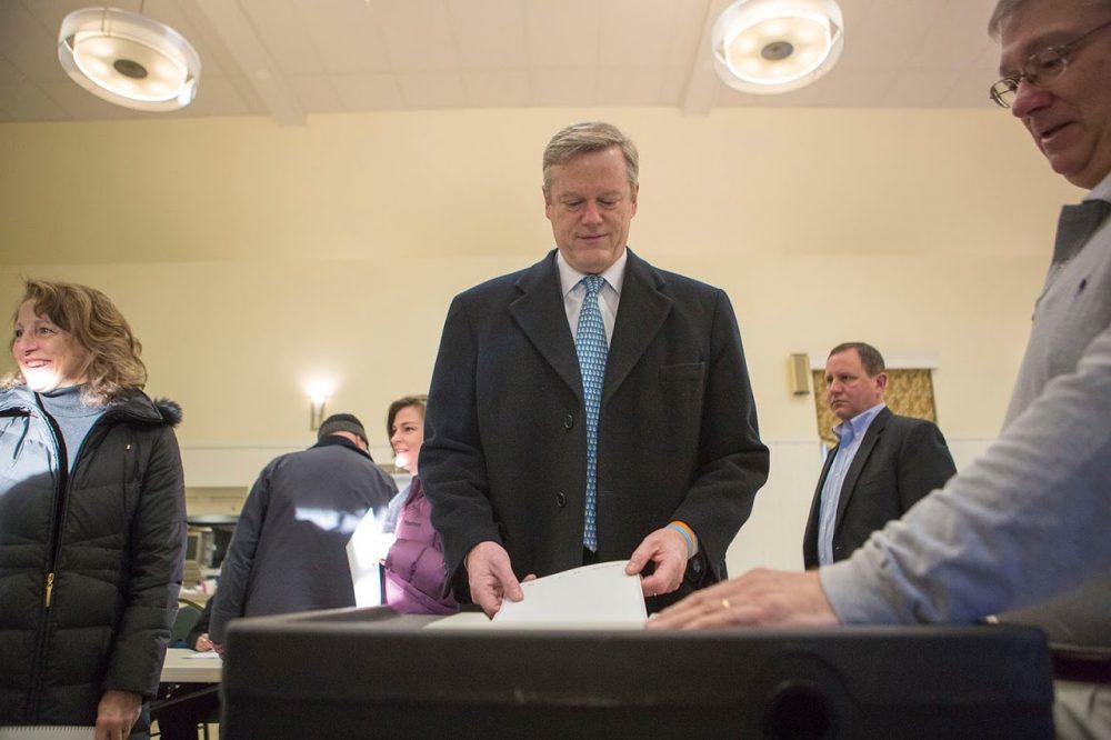 Massachusetts Governor Charlie Baker casts his vote for the Republican Presidential nomination. (Jesse Costa/WBUR)