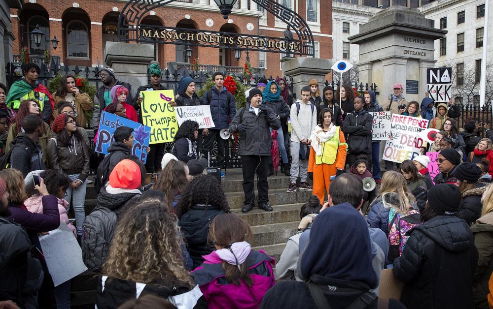 Protesting students from around Boston rally on the steps of the Massachusetts State House. (Robin Lubbock/WBUR)