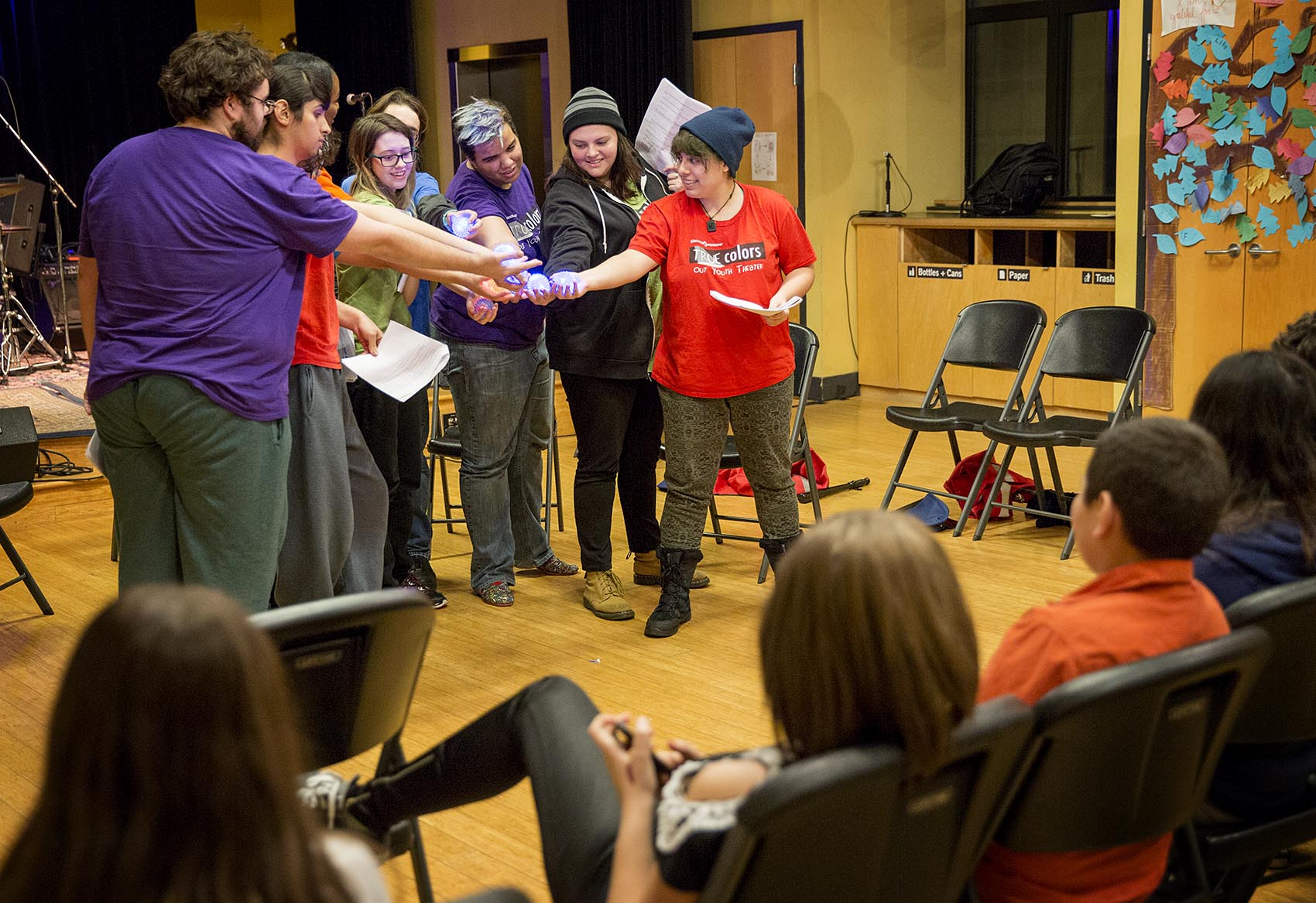 Members of the Boston-based theater troupe True Colors conclude a reading at Zumix in East Boston. (Robin Lubbock/WBUR)
