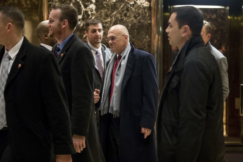 CKE Restaurants CEO Andrew Puzder, center, departs Trump Tower in New York, Wednesday, Dec. 7, 2016. (Andrew Harnik/AP)