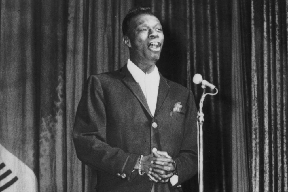 Nat King Cole performing in 1960. (Fox Photos/Getty Images)