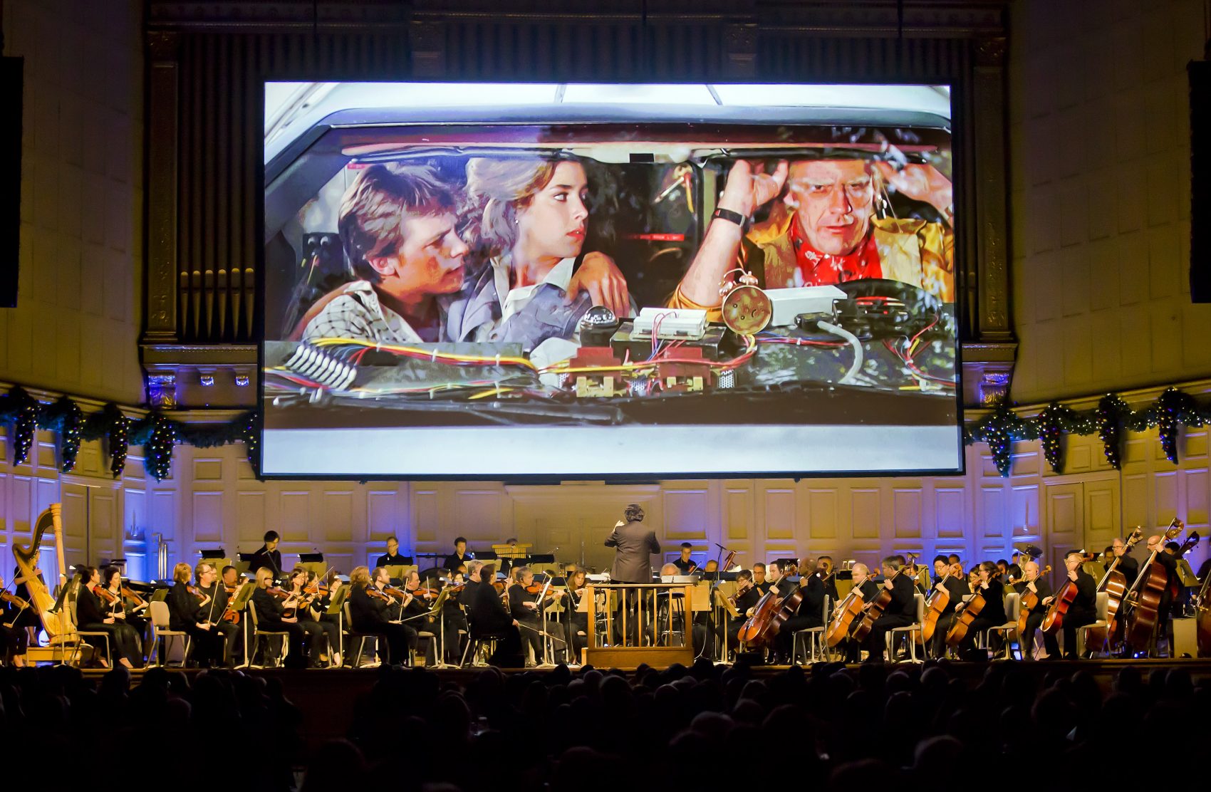 Boston Pops musicians play a "live-to-picture" "Back to the Future" show at Symphony Hall in Boston, Friday, Dec. 30, 2016. (Winslow Townson)