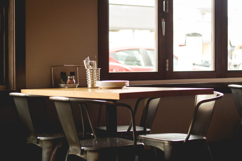 I see people throw a dollar into a barista’s jar for a two-dollar coffee, writes D. Quentin Miller, and I wonder if I’m cheap when I don’t. (Alex Jones/Unsplash)