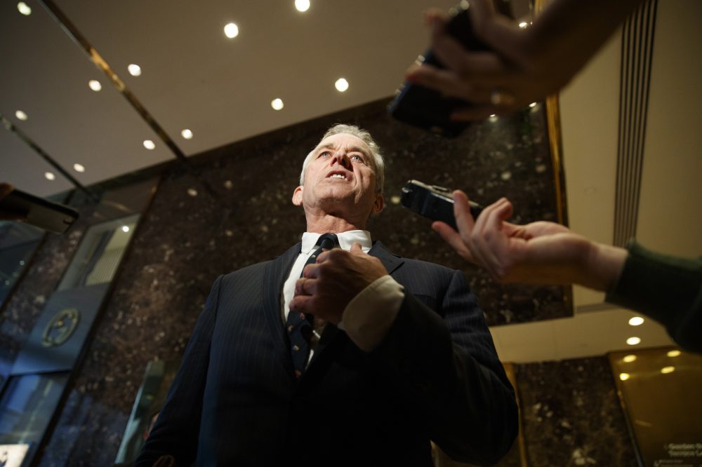 Robert F. Kennedy Jr. talks with reporters in the lobby of Trump Tower in New York on Tuesday, after meeting with President-elect Donald Trump. (Evan Vucci/AP)