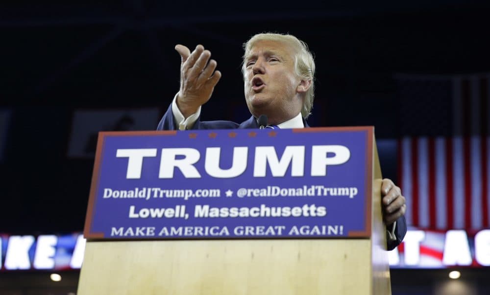 In this file photo, then-Republican presidential candidate Donald Trump gestures during a campaign stop at the Tsongas Center in Lowell on Jan. 4, 2016. (Charles Krupa/AP)