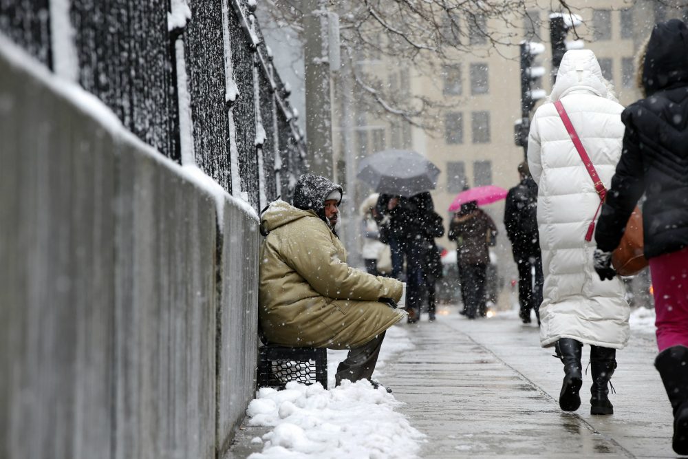 Now more than ever, writes emergency room physician Alister Martin, we must be committed to putting patients over politics. Protecting Medicaid funding is one place to start. Pictured: George &quot;Big G&quot; Dagracia, who is homeless, solicits from passersby under light snow in Boston, Monday, March 21, 2016. (Michael Dwyer/AP)