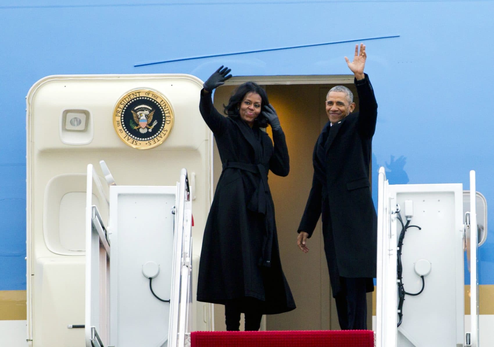The First Lady’s platform, writes Joanna Weiss, has become increasingly powerful, a way to move markets, change minds, and set a standard for a nation full of girls.
Pictured: President Barack Obama and First Lady Michelle Obama wave from Air Force One at Andrews Air Force Base, Md., Tuesday, Jan. 10, 2017. (Jose Luis Magana/AP)