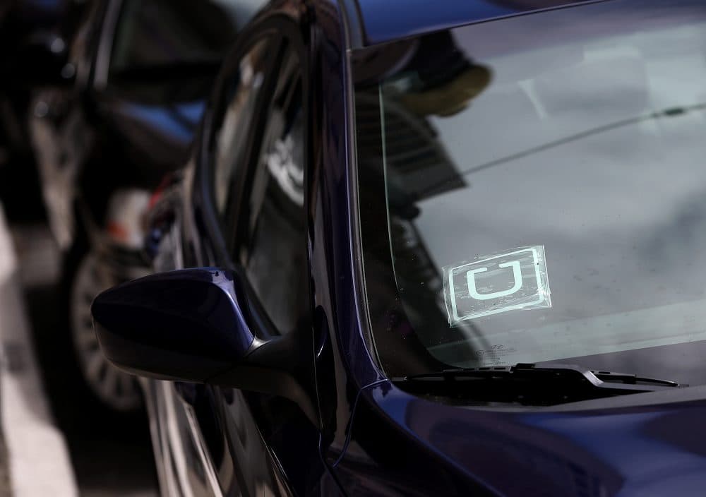 A sticker with the Uber logo is displayed in the window of a car on June 12, 2014 in San Francisco, Calif. (Justin Sullivan/Getty Images)