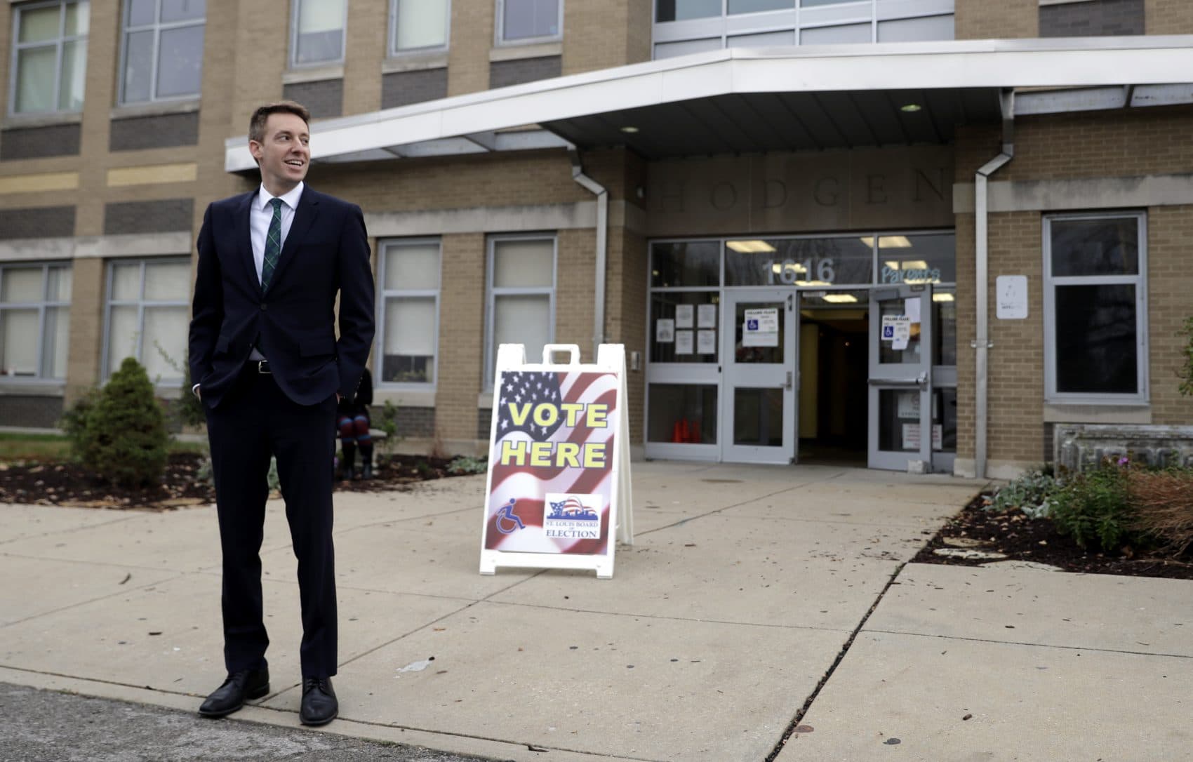 Jason Kander stands outside a polling place on, Nov. 8, 2016, in St. Louis, during his U.S. Senate campaign. (Jeff Roberson/AP)