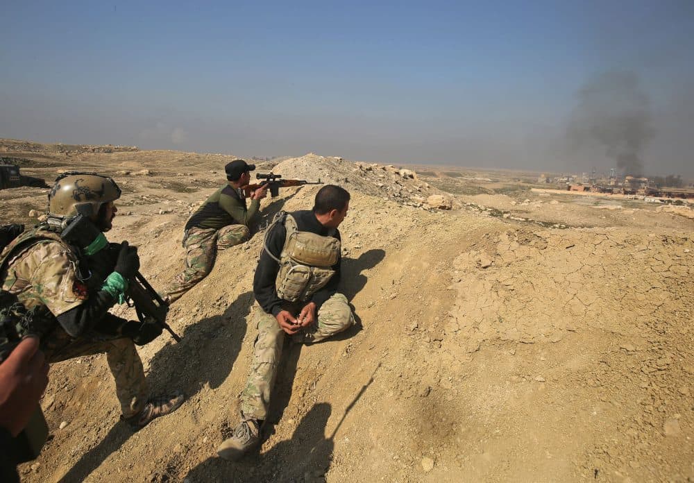 Iraqi forces advance on Feb. 23, 2017, toward Mosul airport on the southern edge of the jihadist stronghold for the first time since the Islamic State group overran the region in 2014. (Ahmad al-Rubaye/AFP/Getty Images)