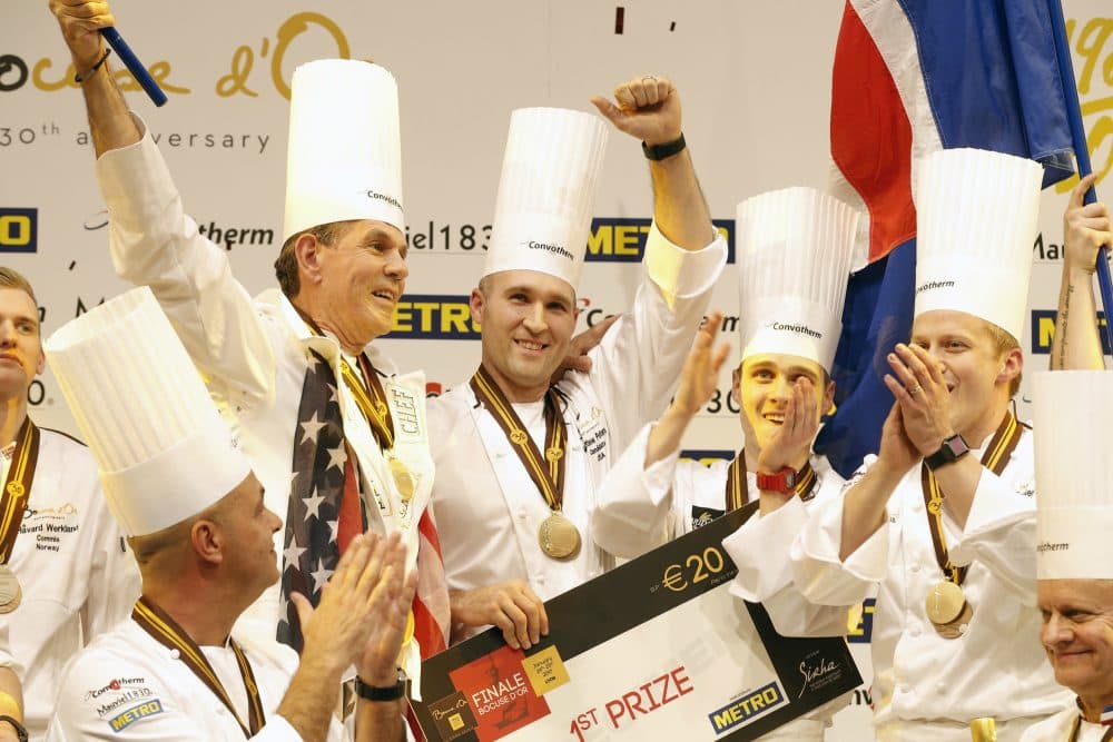 With so many chefs not represented by Team USA, writes Joshua Lewin, I am left wondering what message we are sending the world about the true richness of America's culinary landscape. Pictured: Mathew Peters of USA, centre, celebrates on the podium with teammates after winning the "Bocuse d'Or" (Golden Bocuse) trophy, in Lyon, central France, Wednesday, Jan. 25, 2017. The contest, a sort of world cup of the cuisine, was started in 1987 by Lyon chef Paul Bocuse to reward young international culinary talents. (Laurent Cipriani/AP)