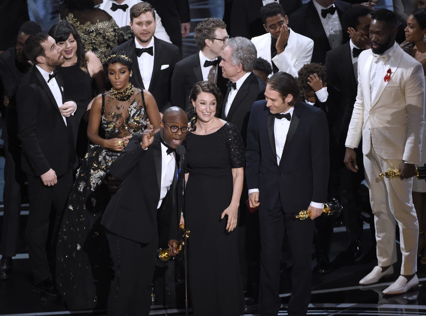 Barry Jenkins and the cast of "Moonlight" accept the award for Best Picture. (Chris Pizzello/Invision/AP)
