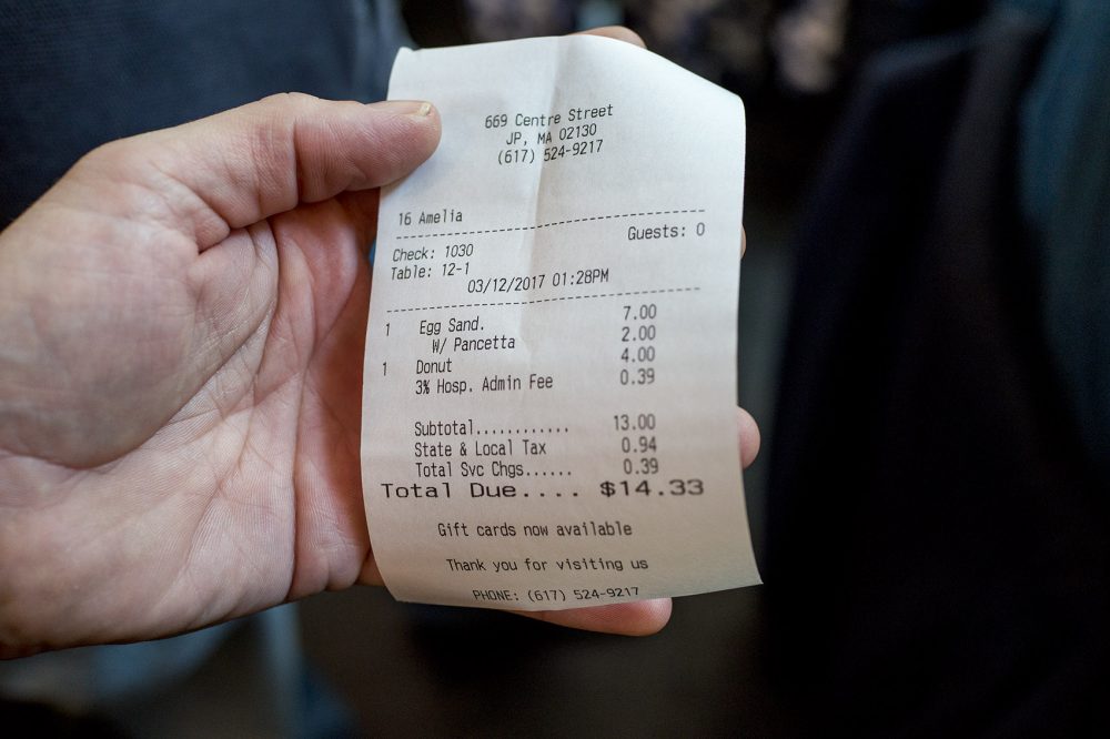 A receipt from Centre Street Cafe includes a 3 percent “hospitality administration fee,” which comes out to 39 cents on $13 of food sales. The entire fee goes to non-tipped employees in the kitchen. (Simón Rios/WBUR)