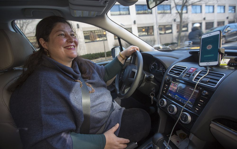 Morgane Matthews drives for Safr, a ride-hailing company that focuses on attracting women drivers and riders. The service recently launched in Boston. (Jesse Costa/WBUR)