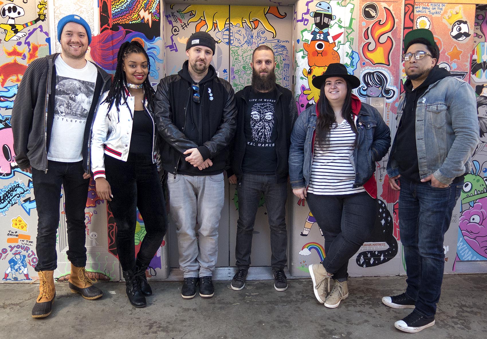 At "Rock Band" developer Harmonix's offices, from left to right: The Record Company's co-founder Matt McArthur, rapper Dutch ReBelle, producer The Arcitype, The Record Company's Program Director Jesse Vengrove, soul-blues singer Julie Rhodes and rapper Moe Pope. (Andrea Shea/WBUR)