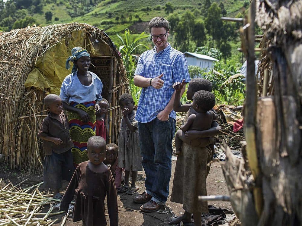 Michael Sharp visited Elizabeth Namavu and children in Mubimbi Camp, home to displaced persons in the Democratic Republic of Congo, during his time in the country. When he was killed, he was part of a U.N. mission. (Jana Asenbrennerova/Courtesy of MCC)