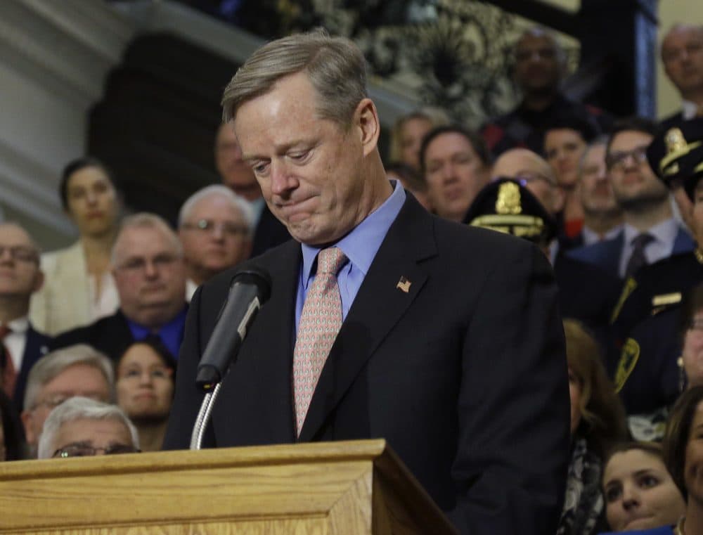Pictured: Mass. Gov. Charlie Baker becomes emotional as he speaks after signing sweeping legislation aimed at reversing a deadly opioid addiction crisis, during a signing ceremony at the Statehouse, Monday, March 14, 2016, in Boston. (Elise Amendola/AP)