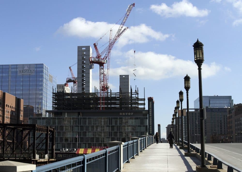 The city needs to stop its giveaway of our waterfront commons and prioritize public space over private greed, writes Bradley Campbell. Pictured: Construction takes place in the Seaport District on Jan. 14, 2016. Boston's Seaport District long was filled with docks, warehouses and parking lots. But in recent years it has become the city's hottest and fastest-growing neighborhood. (Bill Sikes/AP)