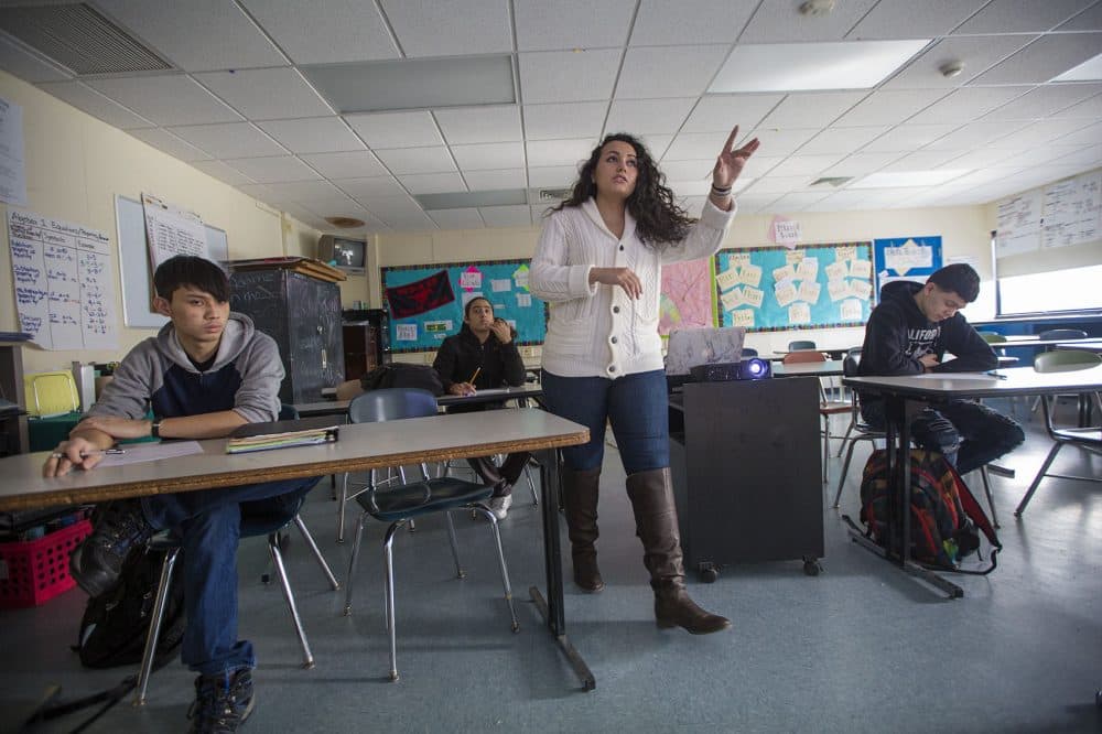 Boston English High math teacher Roma Liani reviews a lesson about perpendicular angles during a geometry class. (Jesse Costa/WBUR)