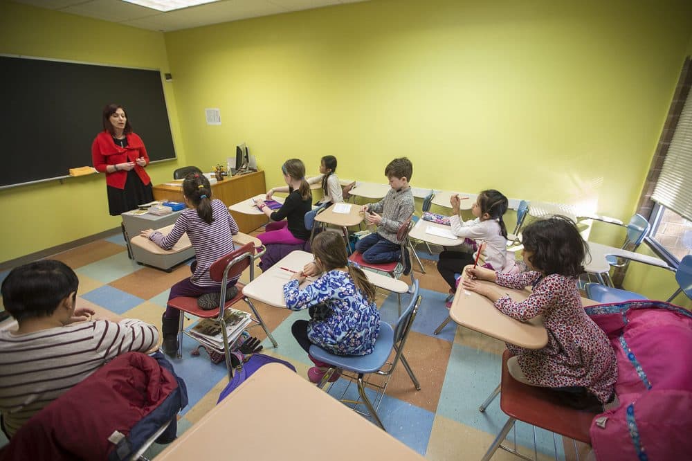 Students prepare to take a test at the Russian School of Mathematics in Newton. (Jesse Costa/WBUR)