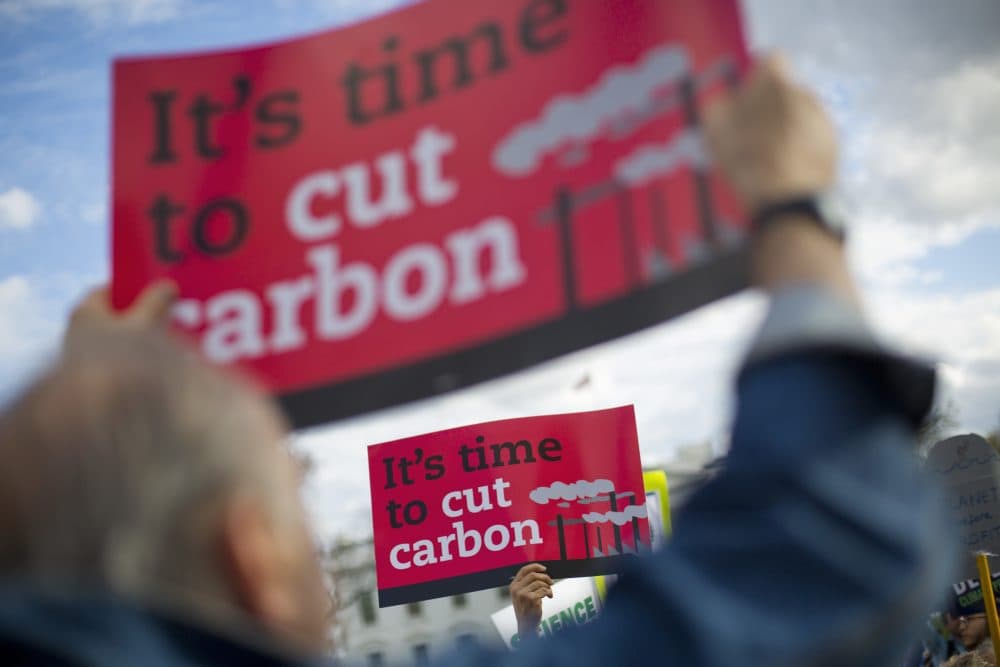 I’m marching to counter the normalization of denial, writes Frederick Hewett. I’m marching because climate change is here today. Pictured: Demonstrators gather in front of the White House, Tuesday, March 28, 2017, during a rally against President Donald Trump's Energy Independence Executive order. (Pablo Martinez Monsivais/AP)