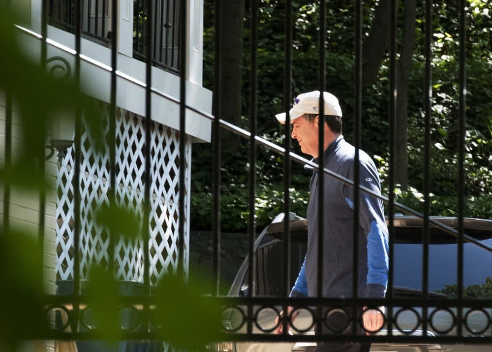 Former FBI Director James Comey walks at his home in McLean, Va., Wednesday, May 10, 2017. (Sait Serkan Gurbuz/AP)