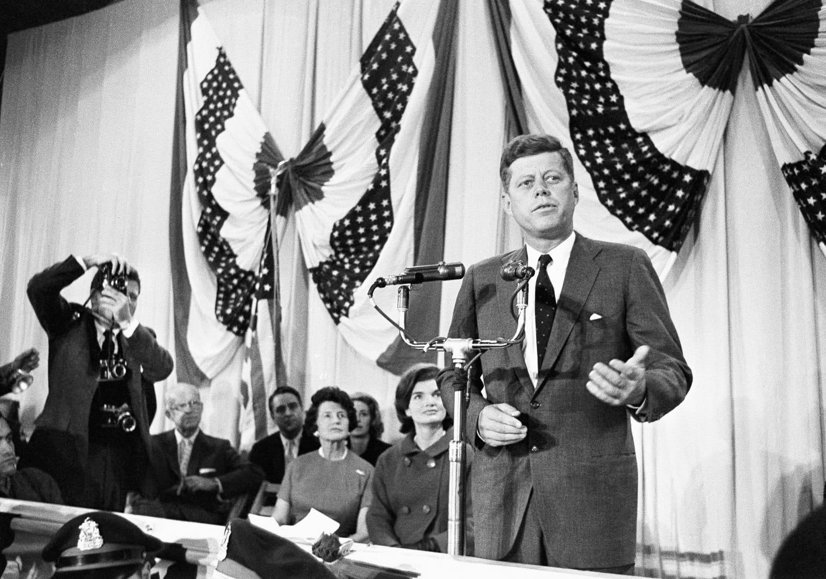 Sen. John F. Kennedy talks to newsmen, Nov. 9, 1960 at the Hyannis Armory, Mass., after his election to the presidency. (AP)