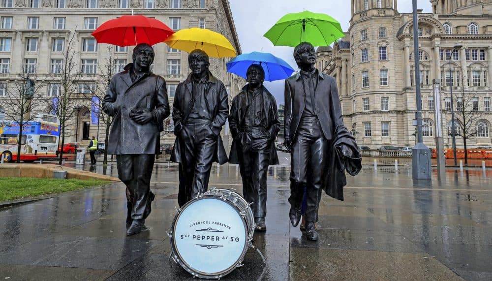 The sixties produced a glorious body of music that spoke to the era’s overheated idol worship, a commentary that still speaks to the Trump phenomenon, writes Tim Riley. In this photo, umbrellas are placed over the statute of the Beatles on Liverpool's waterfront, in Liverpool, England, Wednesday, March 22, 2017. The city is celebrating the half-centenary of "Sgt. Pepper's Lonely Hearts Club Band," one of the band's most influential albums. (Peter Byrne/ PA via AP)