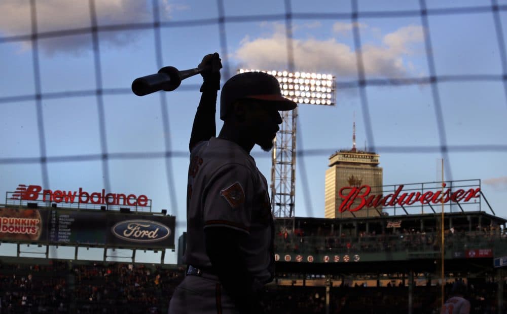 In this Wednesday, May 3, 2017 photo, Baltimore Orioles' Adam Jones prepares to bat prior to the first inning of a baseball game against the Boston Red Sox at Fenway Park in Boston. The teams play the final game of their series, one filled with player ejections and fan controversies, at Fenway Park on Thursday evening. (AP Photo/Charles Krupa)