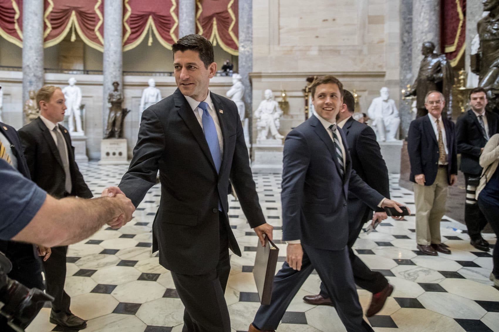 By weaponizing our medical records, the bill creates the foundation for public health crises in America, writes Miles Howard. Pictured: House Speaker Paul Ryan of Wis. greets guests as he walks to the House Chamber on Capitol Hill in Washington, Thursday, before the vote on the health care bill. (Andrew Harnik/AP)